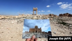 In front of the remains of the historic Temple of Bel ini Palmyra after it was destroyed by Islamic State, in a photo taken on March 31