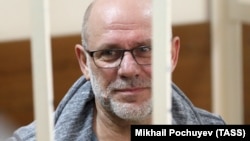 Aleksei Malobrodsky, former art director of the Gogol Center theater, attends a court hearing in Moscow on June 21.