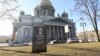 In April, activists placed a mock headstone opposite the famed St. Isaac's Cathedral in St. Petersburg.