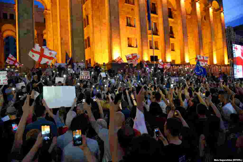 Protesters rally near the country&#39;s parliament in the capital, Tbilisi, on June 23.