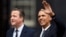 U.S. President Barack Obama (right) and British Prime Minister David Cameron leave 10 Downing Street toward the Foreign Office in London on April 22.