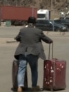 Iran / Armenia - people leaving Iran via the Agarak border crossing with Armenia as conflict with Israel continues - screen grab 3