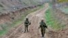 Azerbaijan military sappers clear mines in a countryside outside the town of Fuzuli, November 26, 2020