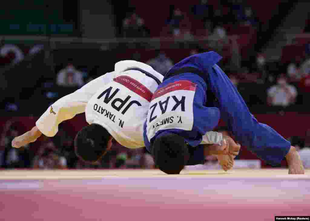 Naohisa Takato of Japan in action against Yeldos Smetov of Kazakhstan at Nippon Budokan in Tokyo, Japan, July 24, 2021. Yeldos Smetov of Kazakhstan took the bronze.