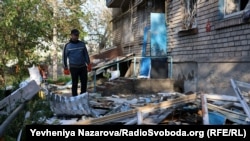 A man inspects the aftermath of a Russian attack on the Ukrainian city of Zaporizhzhya which occurred late on May 1.