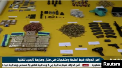 Various weapons shown in a broadcast of Saudi Ekhbariya channel, announcing the capture of Iran backed 'terror cell.' 
