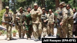 Afghan security reinforcements arrive in Herat to fight against Taliban militants on August 1. 