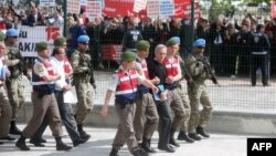 Обвинетите беа донесени пред суд со големо полициско обезбедување