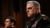 U.S. Chairman of the Joint Chiefs of Staff Gen. Mark A. Milley testifies beside U.S. Defense Secretary Mark Esper before a Senate Armed Services Committee hearing on "Department of Defense Budget Posture" on Capitol Hill in Washington, March 4, 2020