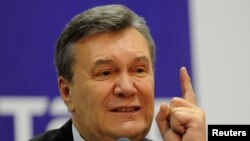 Украинанын экс-президенти Виктор Янукович Ростов-на-Дону шаарында өткөргөн басма сөз жыйынында. 28-ноябрь, 2016-жыл. 