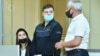 Azerbaijan - Armenian prisoner Viken Euljekian (center) stands trial in Baku, June 8, 2021.