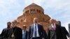 Nagorno-Karabakh -- Armenian Prime Minister Nikol Pashinian (C), Karabakh President Bako Sahakian (R) and Archbishop Pargev Martirosian leave a newly built church in Stepanakert, May 9, 2019.