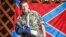 Гражданин России Арсен Павлов (прозвище «Моторола»), боевик группировки «ДНР», которая признана в Украине террористической. Оккупированный Донецк, 11 июля 2014 года