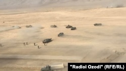 Russian, Tajik, and Uzbek troops conduct join military exercises in Tajikistan near the border with Afghanistan.
