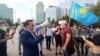 Nurzhan Altaev (with bullhorn) and members of the El Tiregi party rally in Nur-Sultan on September 7.