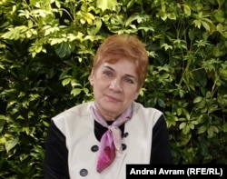 Andreea Pora, jurnalistă la Revista 22.