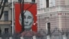 A skeletal depiction of Russian President Vladimir Putin on a building facing the Russian Embassy in Riga, Latvia, photographed in January 2023
