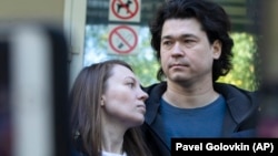 Olga Prokazova and Dmitry Prokazov after appearing in court in Moscow in August.