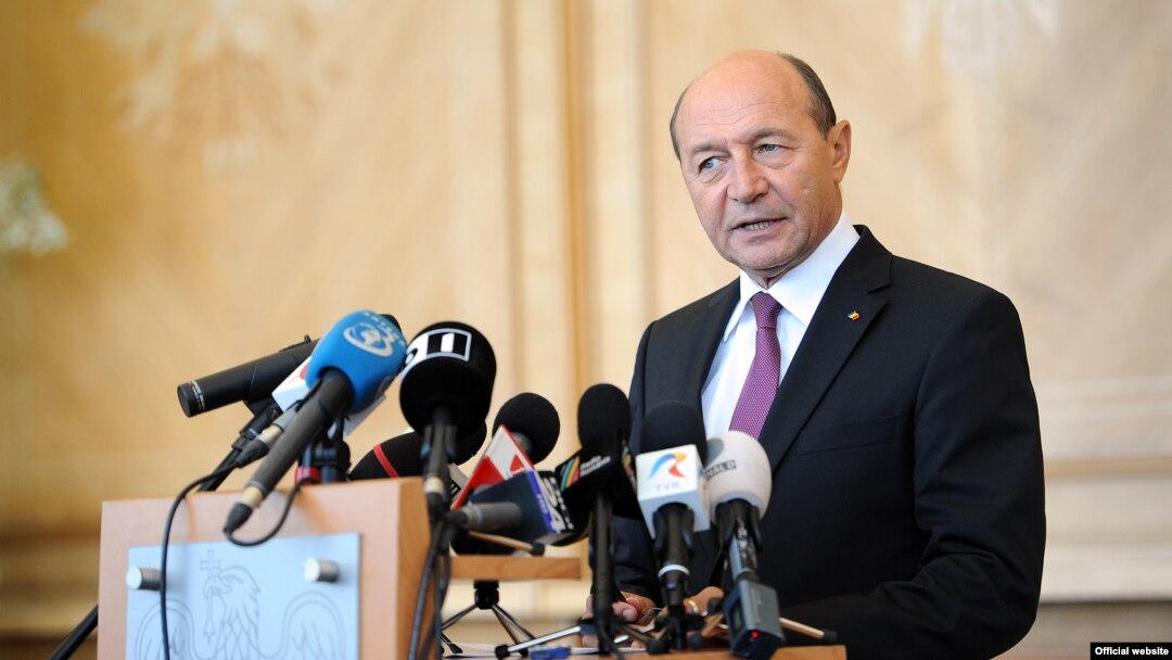 Romanian President Traian Basescu (pictured) has a secret plan to annex Moldova, says Russian Deputy Prime Minister Dmitry Rogozin.