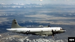 An undated handout picture shows a U.S. Navy EP-3 flying over an unknown location. According to a US Defense Department spokesman two Chinese jets have conducted an 'unsafe' intercept