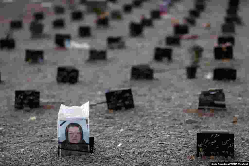 A cemetery south of Tehran where victims of the coronavirus are buried. Nearly 63,000 people have died from COVID-19 in Iran since the pandemic began, according to figures compiled by Johns Hopkins University. (WANA via Reuters/Majid Asgaripour)