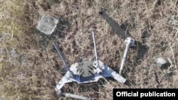 Nagorno-Karabakh - A photograph released by Karabakh Armenian forces purportedly shows a fragment of an Azerbaijani combat drone that attacked one of their positions on August 11, 2021.