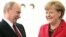 ვლადიმირ პუტინი და ანგელა მერკელი
