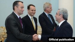 Armenia - President Serzh Sarkisian (R) meets with the visiting foreign ministers of Bulgaria, Poland and Sweden in Yerevan, 14Dec2012.