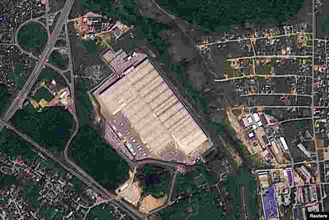 Before-and-after satellite images released by Planet Labs PBC show a Wildberries facility in Novosemeykino in Russia's Samara region that was hit by Ukrainian drones on August 2.