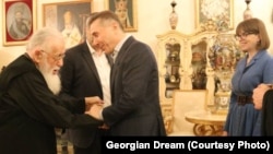 Католикос-Патриарх всея Грузии Илия II с Бидзиной Иванишвили и его супругой, архивная фотография