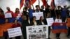 Israel -- Members of the Armenian community hold flags and placards as they protest against the selling of Israeli weapons to Azerbaijan outside the foreign ministry in Jerusalem, April 14, 2016.