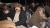 Ali Wazir (left) attends a funeral for a PTM activist in Qilla Saifullah, southwestern Pakistan, in February 2019.