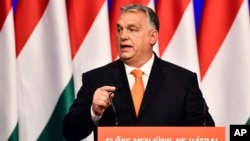 Viktor Orban delivers his annual state-of-the-nation speech in Budapest on February 12. The EU is waging "a holy war, a jihad" under the slogan of the rule of law,  he said.