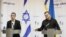 Israeli Foreign Minister Eli Cohen (left) and Ukrainian Foreign Minister Dmytro Kuleba attend a press conference in Kyiv on February 16. 