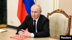 Fotoarhiv. Predsednik Rusije Vladimir Putin, za koga je Međunarodni krivični sud u martu 2023. izdao nalog za hapšenje, optužujući ga za razne zločine počinjene tokom invazije na Ukrajinu. 