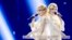 Ресейлік Анастасия мен Мария  Толмачевалар Eurovision байқауында. Копегаген, 5 мамыр 2014 жыл. 
