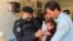 Police in Khyber Pakhtunkhwa Province's Bajaur district take part in vaccinating children again polio in September. 