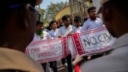 Students protest against the Citizenship Amendment Act in Guwahati, India, on March 12. The new rules implemented by New Delhi on March 11 exclude Muslims, who are the majority in all three countries. 