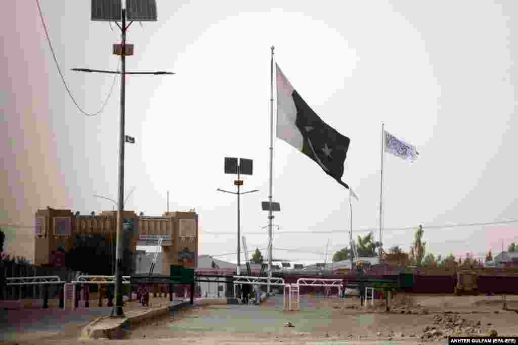 An Afghan Taliban flag is raised on the Afghan side of the Pakistani-Afghan border at Chaman, Pakistan, on July 14.&nbsp;