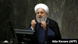 IRAN -- Iranian President Hassan Rouhani addresses the Iranian Parliament in the capital Tehran, August 28, 2018