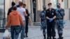 Russia -- The Russian National Guard (Rosgvardiya) soldiers and police officers patrol in downtown Moscow on June 8, 2020.