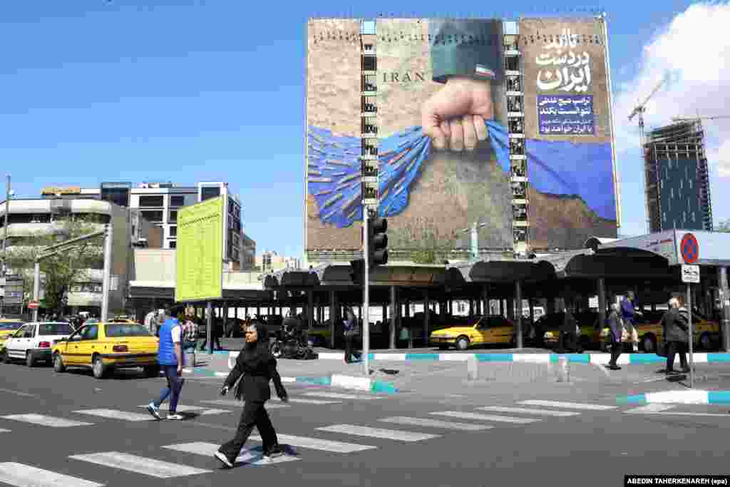 A propaganda billboard in Tehran photographed on April 15 references the crisis in the Strait of Hormuz.