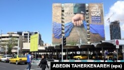 A propaganda billboard in Tehran photographed on April 15 references the crisis in the Strait of Hormuz.