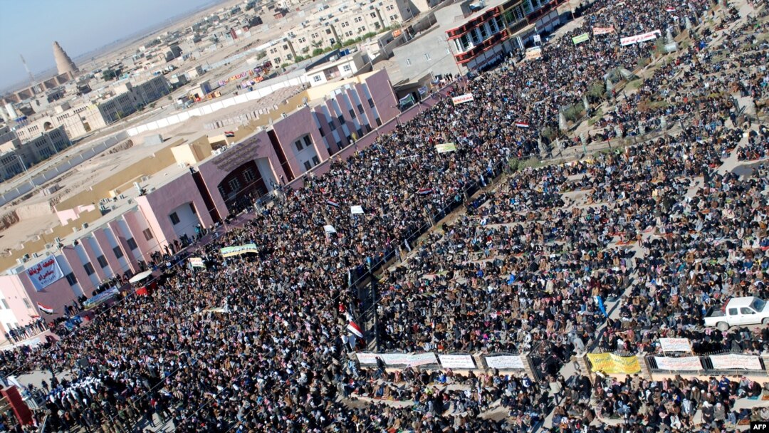 Sunni demonstrators gather for an antigovernment protest in the central city of Samarra on January 11.