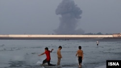 A view of the Strait of Hormuz from the coast of Bandar Abbas on July 13 after air strikes in the area.