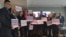 Zaposleni u mađarskoj avio kompaniji Wizz Air drže transparente protiv potencijanog ukidanja baze te kompanije na beogradskom aerodromu, Beograd, 18. jun 2026.