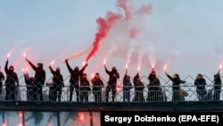 Members of the far-right Azov National Druzhyna militia rally in December 2017. 