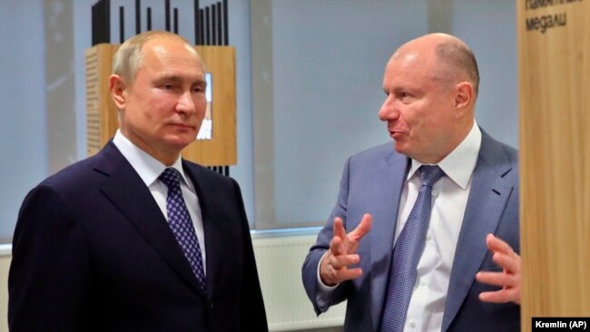 Владимир Путин със собственика на "Норилск Никел" Владимир Потанин