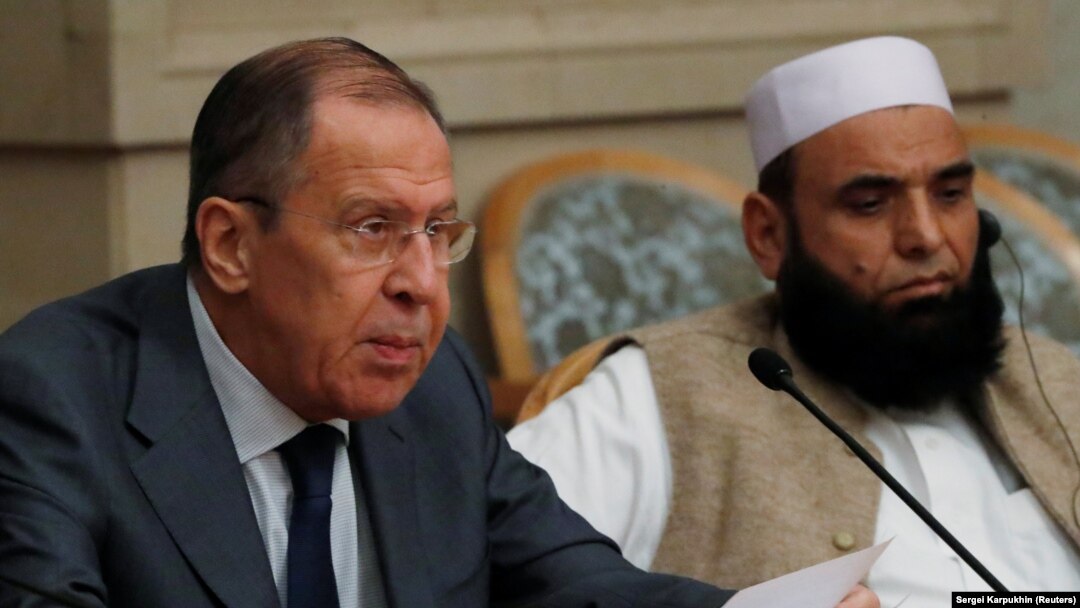 Russian Foreign Minister Sergei Lavrov (left) and Taliban delegate Alhaj Mohammad Sohail Shaina take part in multilateral peace talks on Afghanistan in Moscow in November 2018. 