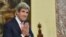 U.S. Secretary of State John Kerry gestures during a meeting in Italy on May 9, when he issued the warning about arming Syria with Russian missiles.